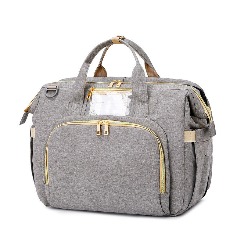 Multifunction diaper bag – with fold-out crib and storage compartments