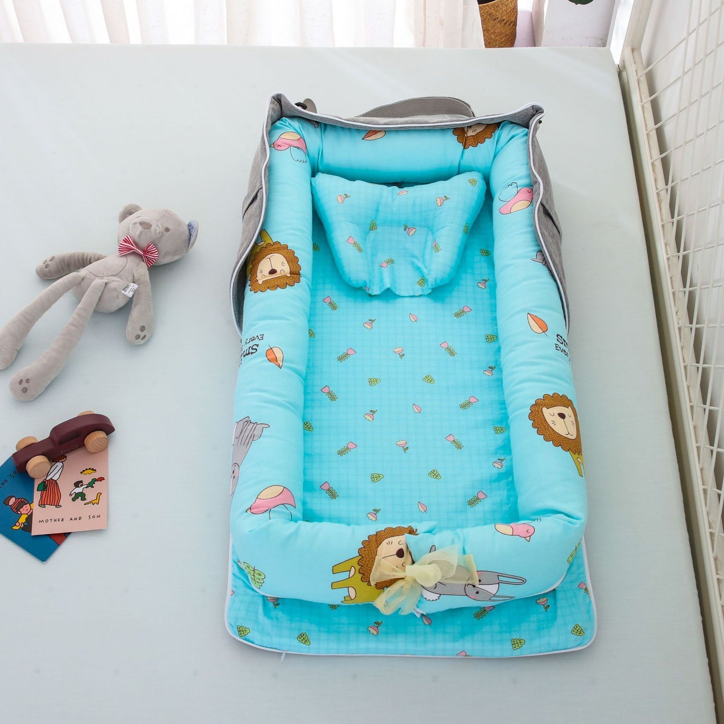 Compact travel baby bed – breathable and washable cotton lounger