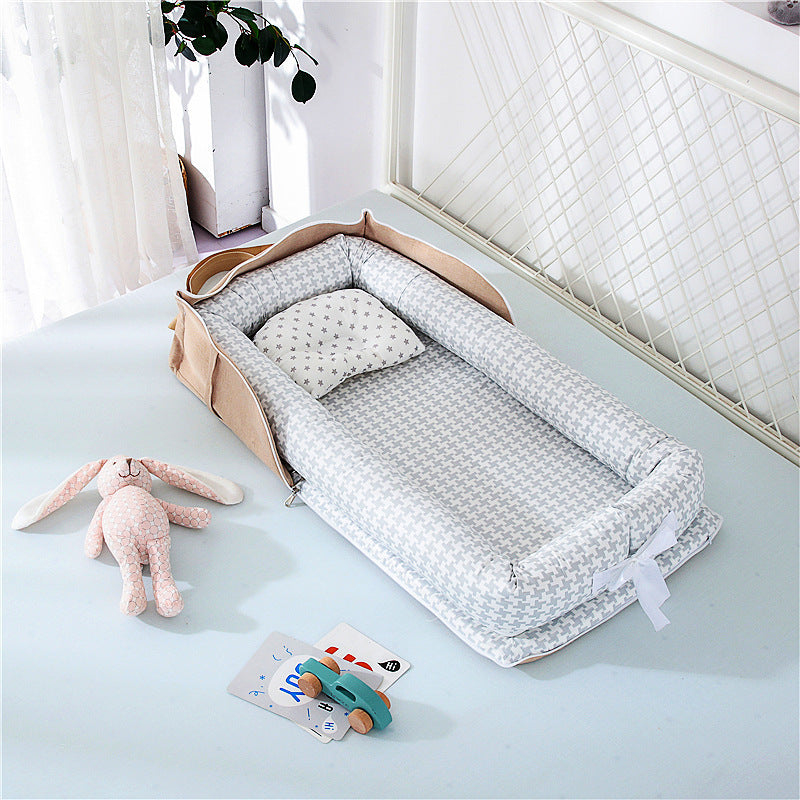 Compact travel baby bed – breathable and washable cotton lounger