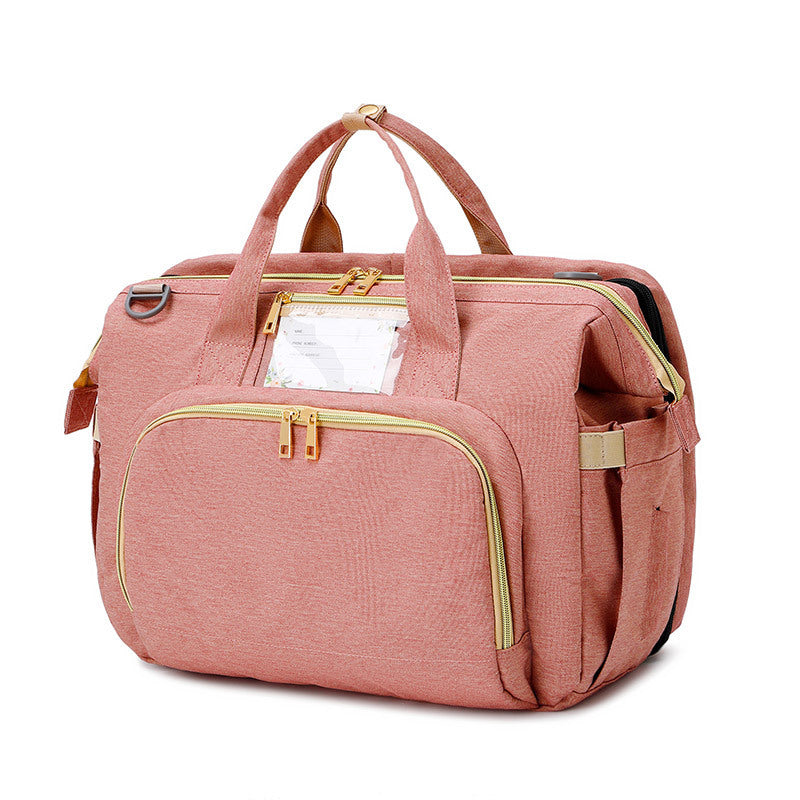 Multifunction diaper bag – with fold-out crib and storage compartments