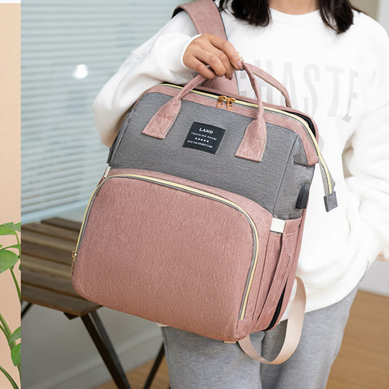3-in-1 diaper bag backpack – with portable baby crib & insulated bottle holders