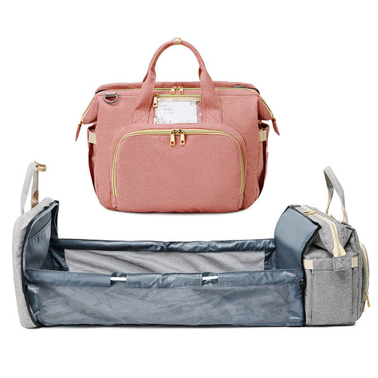 Multifunction diaper bag – with fold-out crib and storage compartments