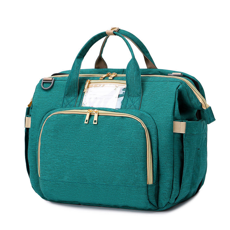 Multifunction diaper bag – with fold-out crib and storage compartments